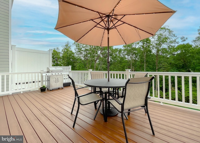 45375 Concord Way, California, MD 20619 - deck with outdoor dining area, area for grilling, and view of scattered trees