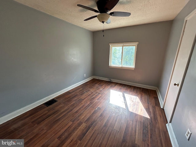 23341 Great Cove Rd, Mcconnellsburg, PA 17233 - unfurnished room featuring a textured ceiling, a ceiling fan, and dark wood-style floors