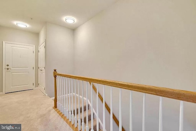 2665 Prosperity Ave Unit 6, Fairfax, VA 22031 - corridor featuring light carpet, an upstairs landing, and baseboards