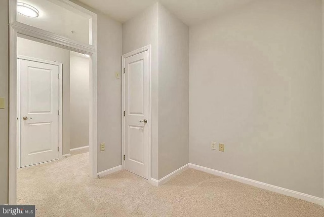 2665 Prosperity Ave Unit 6, Fairfax, VA 22031 - unfurnished bedroom featuring light carpet and baseboards