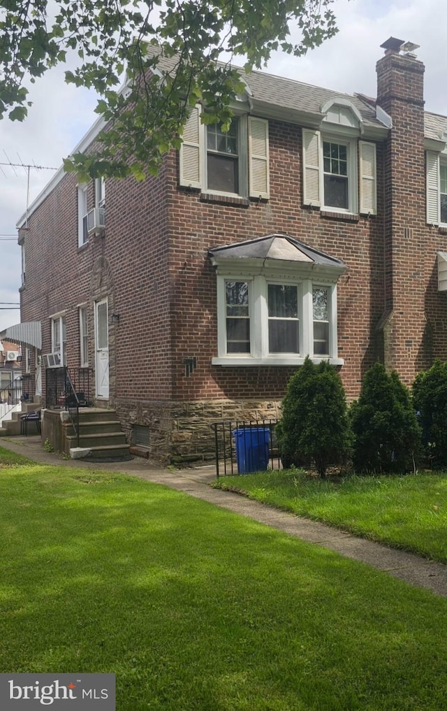 6517 Montour St, Philadelphia, PA 19111 - view of front of home featuring a front lawn and brick siding