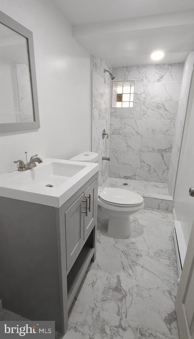 6517 Montour St, Philadelphia, PA 19111 - bathroom featuring vanity, a stall shower, toilet, and marble look tiles
