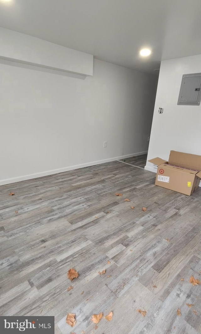 6517 Montour St, Philadelphia, PA 19111 - unfurnished room with wood finished floors, electric panel, and baseboards