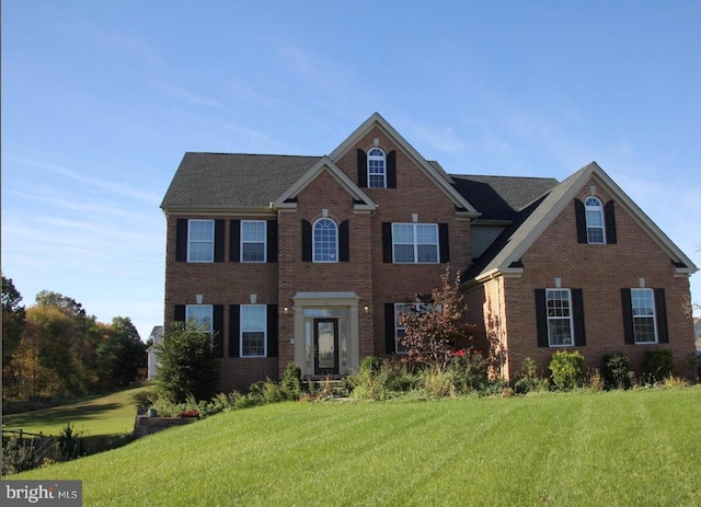 6 Monet Ct, Monmouth Junction, NJ 08852 - colonial inspired home with brick siding and a front lawn