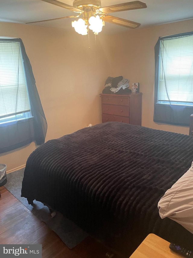 808 W Penn Pines Blvd, Aldan, PA 19018 - bedroom with wood finished floors, a ceiling fan, and baseboards