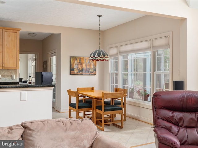 228 Sunset Cir, Cross Junction, VA 22625 - dining space with plenty of natural light and baseboards
