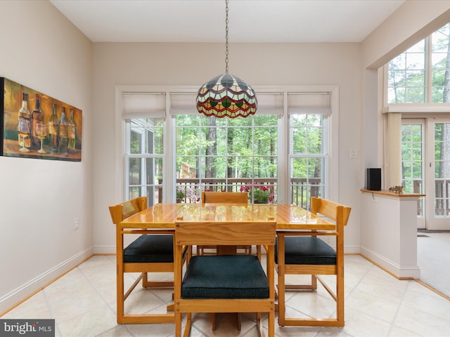 228 Sunset Cir, Cross Junction, VA 22625 - dining area featuring light tile patterned floors and baseboards
