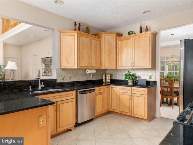 228 Sunset Cir, Cross Junction, VA 22625 - kitchen with appliances with stainless steel finishes, a sink, light brown cabinetry, backsplash, and dark stone counters