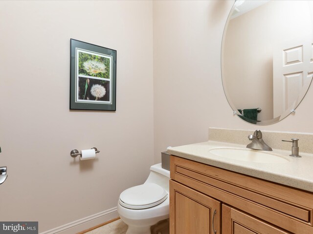 228 Sunset Cir, Cross Junction, VA 22625 - bathroom with vanity, toilet, and baseboards