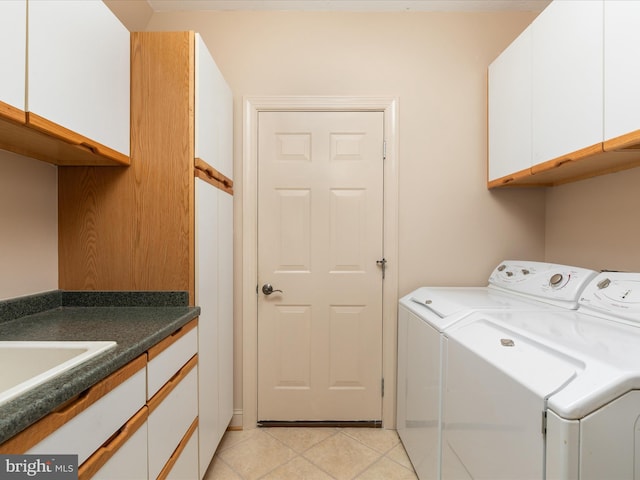 228 Sunset Cir, Cross Junction, VA 22625 - washroom with cabinet space, washing machine and clothes dryer, and light tile patterned flooring