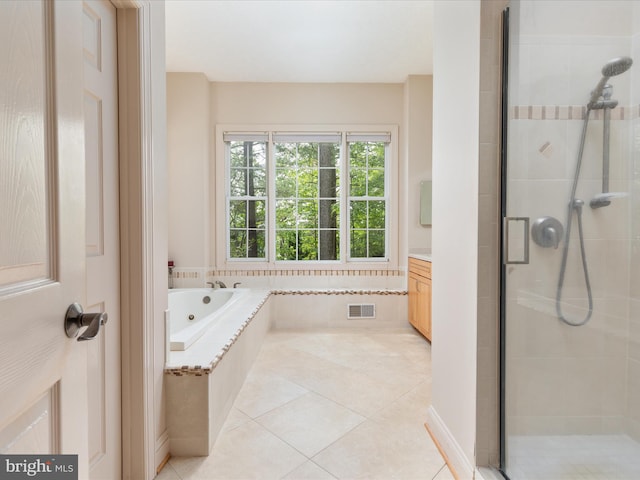 228 Sunset Cir, Cross Junction, VA 22625 - bathroom featuring a stall shower, vanity, a whirlpool tub, and tile patterned floors