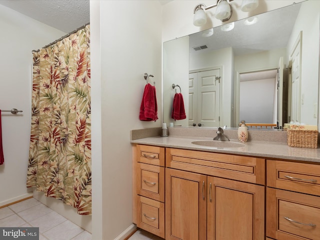228 Sunset Cir, Cross Junction, VA 22625 - full bath with vanity, tile patterned flooring, and baseboards