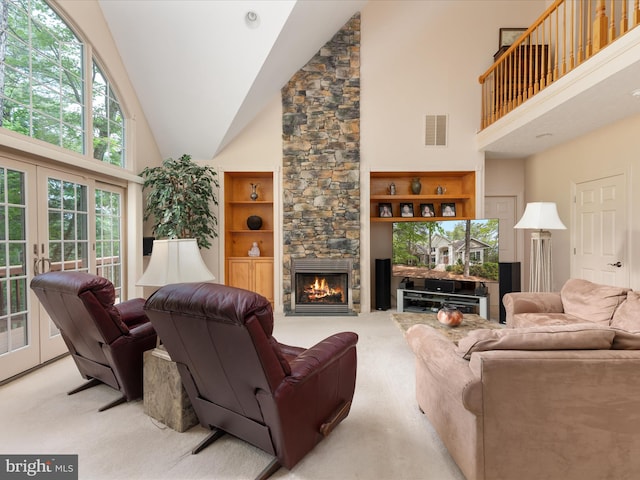 228 Sunset Cir, Cross Junction, VA 22625 - living area with high vaulted ceiling, light colored carpet, a fireplace, and french doors
