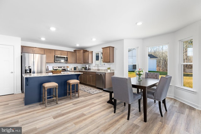 7443 Long Leaf Ln, King George, VA 22485 - dining area featuring light wood finished floors, recessed lighting, and baseboards