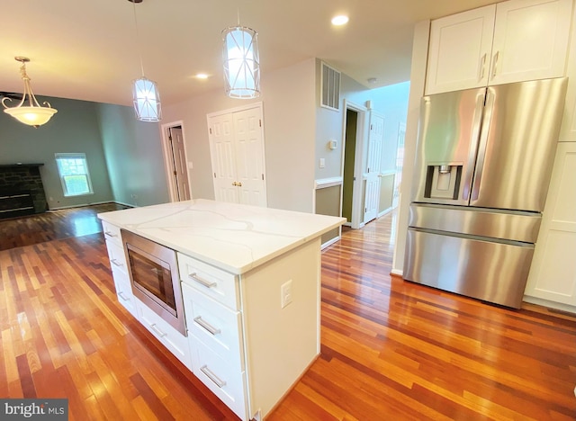 1176 Bandy Run Rd, Herndon, VA 20170 - kitchen featuring stainless steel appliances, light wood-style flooring, white cabinetry, and recessed lighting