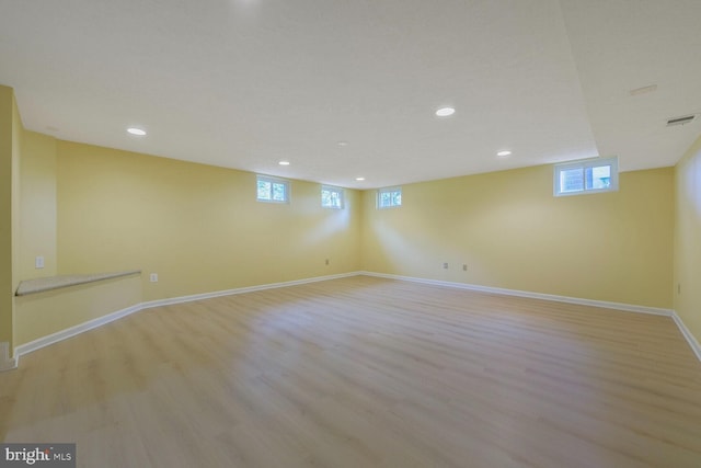 1176 Bandy Run Rd, Herndon, VA 20170 - below grade area featuring recessed lighting, light wood-style floors, and baseboards