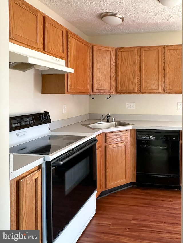 22565 Upper Kells Ln, Great Mills, MD 20634 - kitchen featuring range with electric stovetop, dishwasher, under cabinet range hood, a sink, and dark wood-style floors