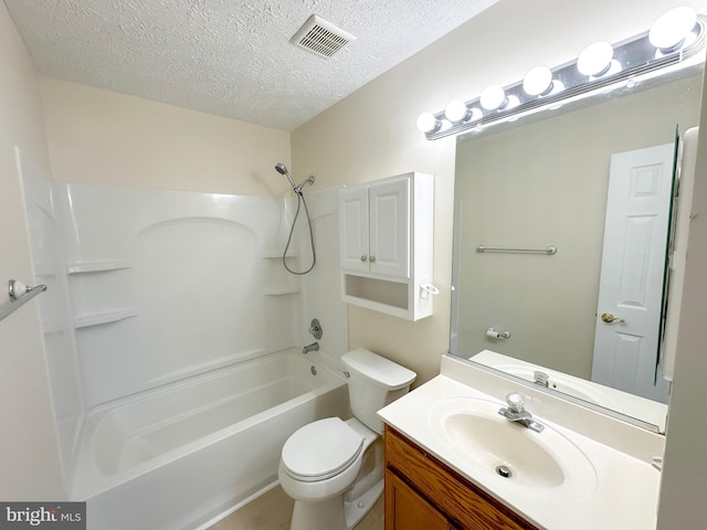 22565 Upper Kells Ln, Great Mills, MD 20634 - full bathroom with a textured ceiling,  shower combination, toilet, and vanity