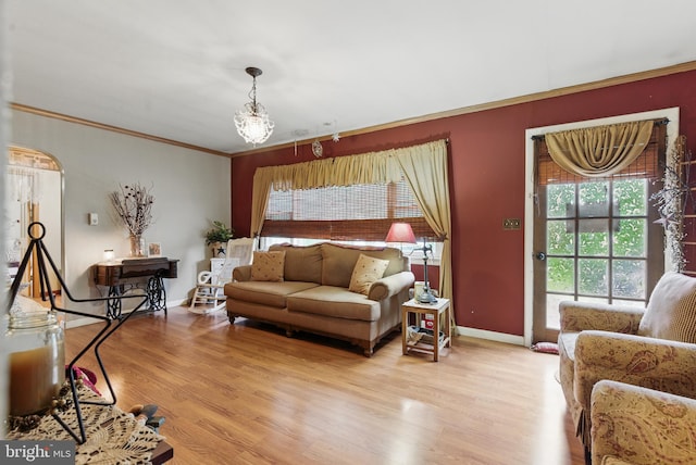 4203 William Penn Hwy, Easton, PA 18045 - living room with light wood finished floors, crown molding, baseboards, and arched walkways