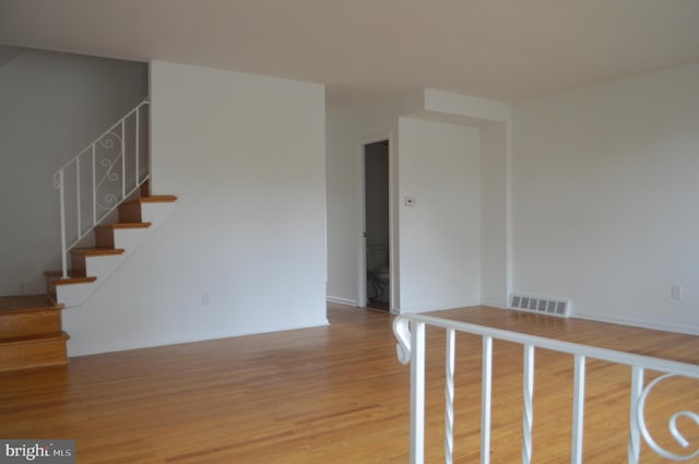 10209 Woburn Pl, Philadelphia, PA 19114 - stairway with wood finished floors and baseboards
