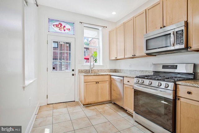 743 W Cross St, Baltimore, MD 21230 - kitchen with appliances with stainless steel finishes, light brown cabinetry, light tile patterned floors, and recessed lighting