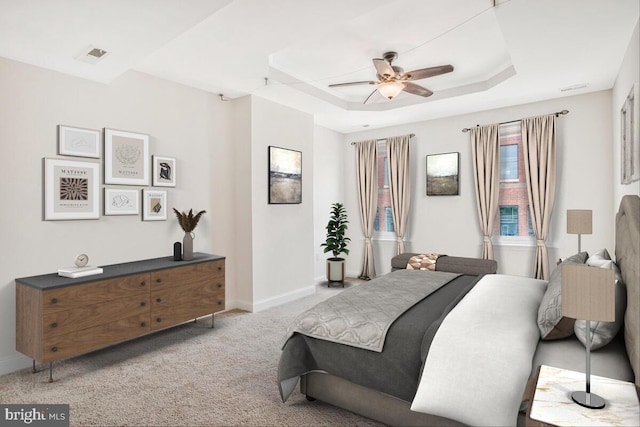 743 W Cross St, Baltimore, MD 21230 - bedroom with light carpet, a raised ceiling, and a ceiling fan