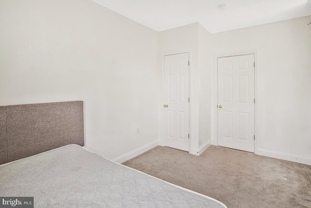 743 W Cross St, Baltimore, MD 21230 - unfurnished bedroom featuring carpet and baseboards