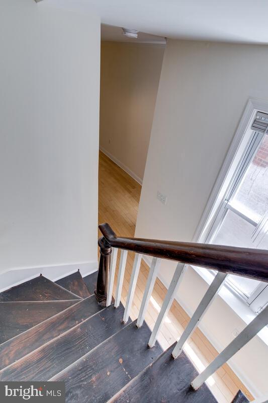 743 W Cross St, Baltimore, MD 21230 - stairway with wood finished floors
