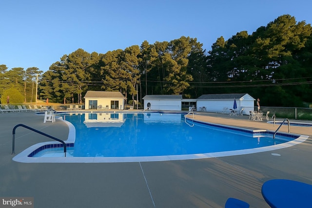520 Glebe Rd S, Montross, VA 22520 - community pool with a patio area and an outdoor structure