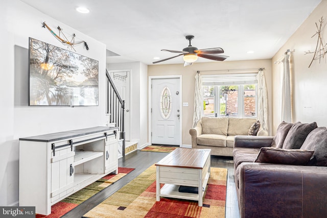656 48th St, Baltimore, MD 21224 - living room featuring a ceiling fan, dark wood finished floors, stairs, recessed lighting, and baseboards