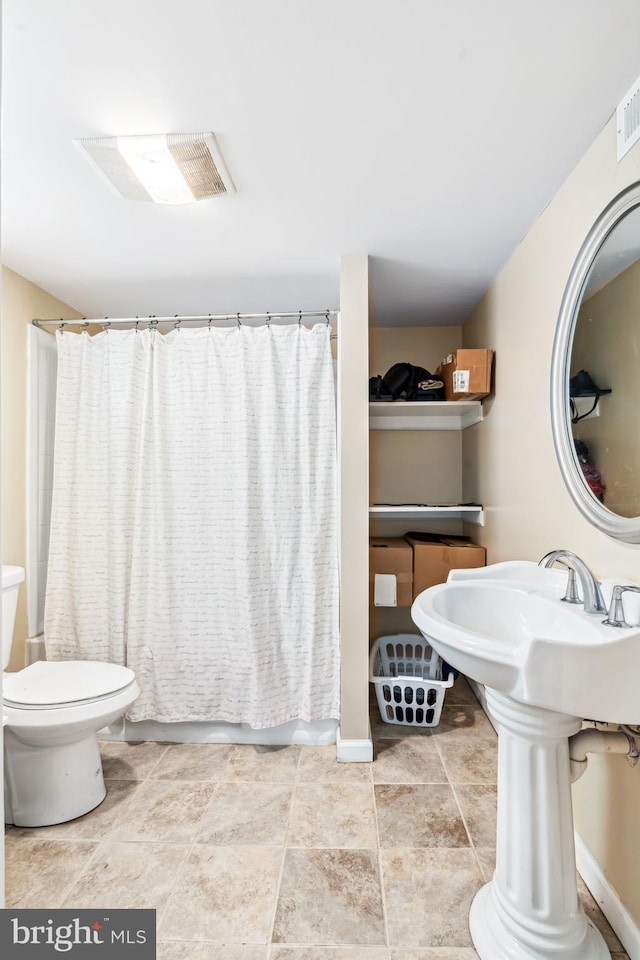 656 48th St, Baltimore, MD 21224 - full bathroom with toilet, a sink, and a shower with curtain
