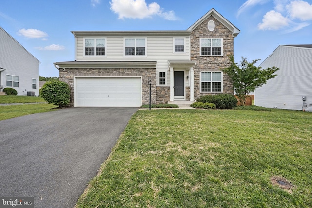11 Worsham Ln, Fredericksburg, VA 22405 - view of front of house featuring stone siding, driveway, a garage, and a front lawn