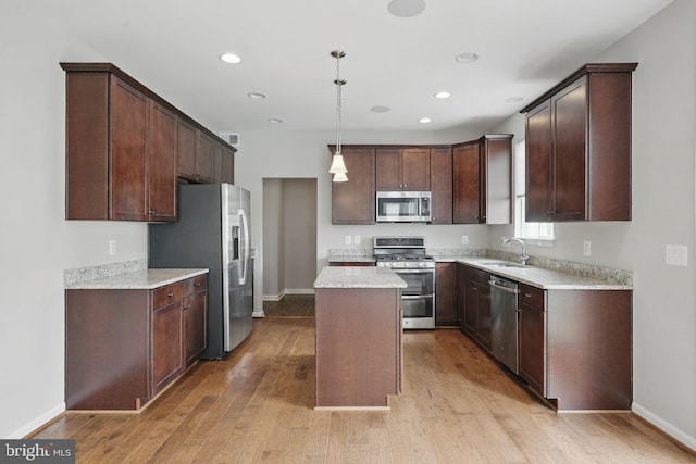 11 Worsham Ln, Fredericksburg, VA 22405 - kitchen with appliances with stainless steel finishes, a sink, a center island, baseboards, and recessed lighting