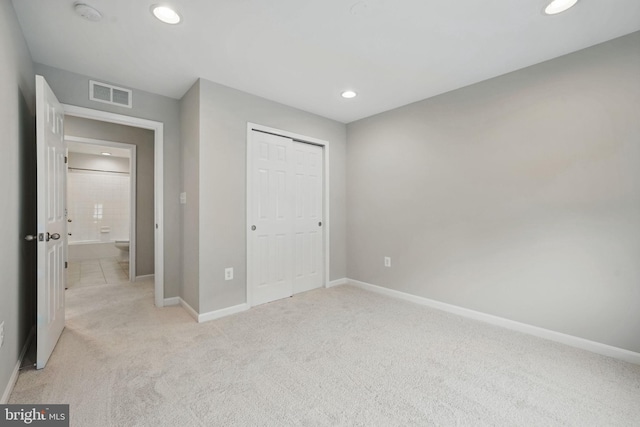 11 Worsham Ln, Fredericksburg, VA 22405 - unfurnished bedroom with light colored carpet, baseboards, recessed lighting, and a closet