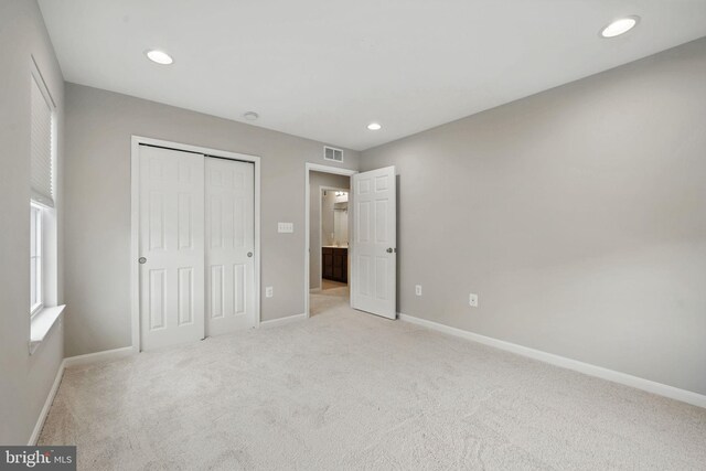 11 Worsham Ln, Fredericksburg, VA 22405 - unfurnished bedroom featuring baseboards, light colored carpet, a closet, and recessed lighting