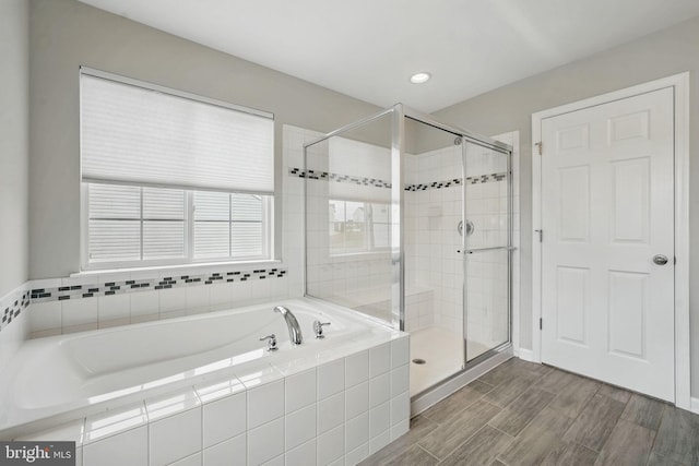 11 Worsham Ln, Fredericksburg, VA 22405 - bathroom with a bath, a shower stall, recessed lighting, and wood finished floors