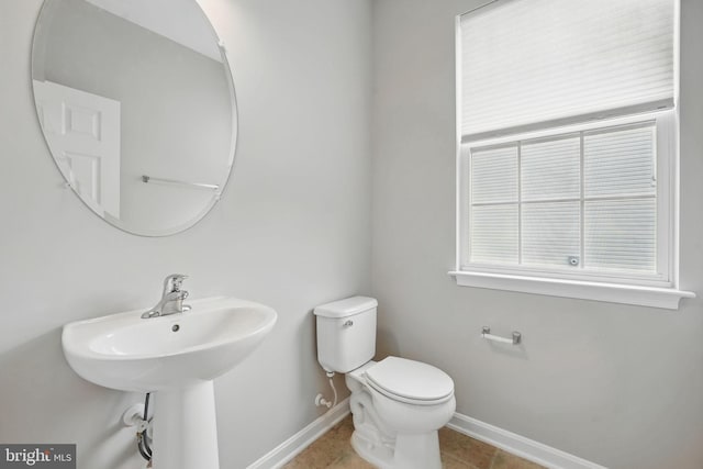11 Worsham Ln, Fredericksburg, VA 22405 - bathroom featuring toilet, baseboards, and tile patterned flooring
