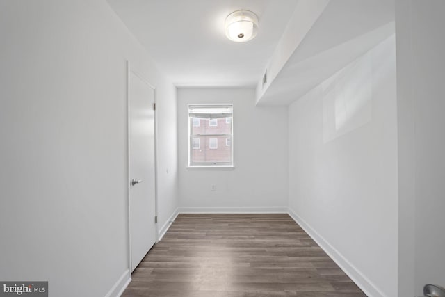 2900 Pomeroy Rd SE Unit 203, Washington, DC 20020 - interior space featuring dark wood-style floors and baseboards