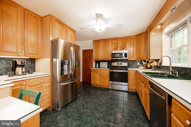 337 Greene Rd, Berwyn, PA 19312 - kitchen featuring appliances with stainless steel finishes, a sink, tasteful backsplash, and ceiling fan