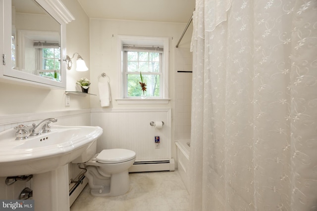 337 Greene Rd, Berwyn, PA 19312 - bathroom featuring a baseboard heating unit, toilet, shower / bathtub combination with curtain, wainscoting, and tile patterned flooring