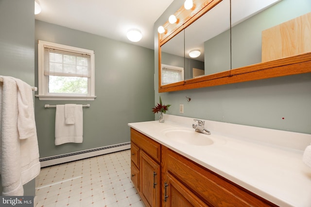 337 Greene Rd, Berwyn, PA 19312 - bathroom with a baseboard heating unit, tile patterned floors, and vanity