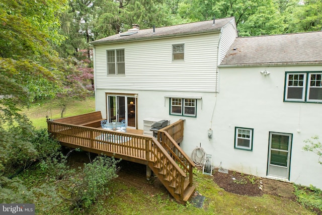 337 Greene Rd, Berwyn, PA 19312 - back of house with stucco siding, a wooden deck, stairs, and a shingled roof