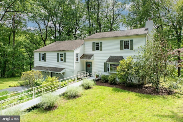 337 Greene Rd, Berwyn, PA 19312 - view of front of home with a chimney, roof with shingles, and view of wooded area