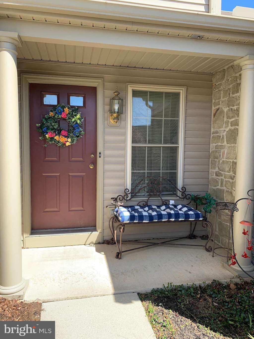 1919 Limestone Dr, Hummelstown, PA 17036 - doorway to property with a porch and stone siding