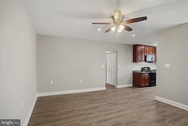 3922 Rolling Rd Unit A8, Pikesville, MD 21208 - unfurnished living room with ceiling fan, wood finished floors, and recessed lighting