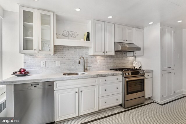 1830 S Rittenhouse Square 12C And 12D, Philadelphia, PA 19103 - kitchen featuring appliances with stainless steel finishes, under cabinet range hood, a sink, white cabinets, and recessed lighting