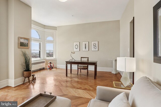 1830 S Rittenhouse Square 12C And 12D, Philadelphia, PA 19103 - living room featuring radiator heating unit and baseboards