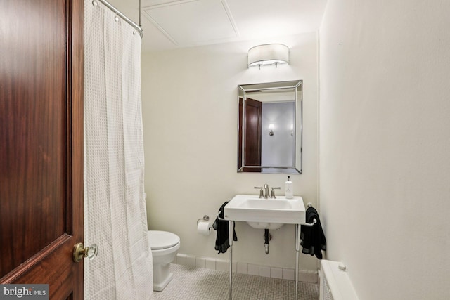 1830 S Rittenhouse Square 12C And 12D, Philadelphia, PA 19103 - full bath with toilet, tile patterned floors, a shower with shower curtain, and a sink