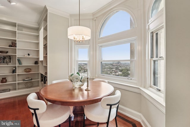 1830 S Rittenhouse Square 12C And 12D, Philadelphia, PA 19103 - dining space with plenty of natural light, a chandelier, wood finished floors, baseboards, and crown molding