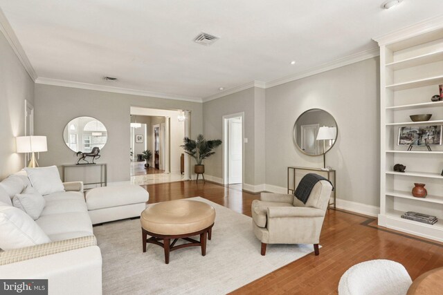 1830 S Rittenhouse Square 12C And 12D, Philadelphia, PA 19103 - living area with wood finished floors, baseboards, ornamental molding, and built in features